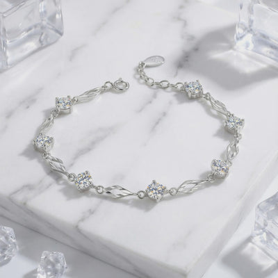 A solid gold bracelet with simulated diamonds.