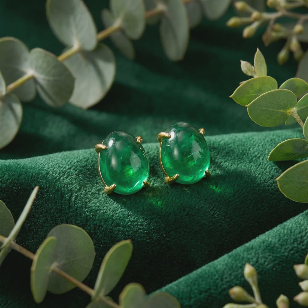 Elianore oval simulated emerald stud earrings in solid gold.