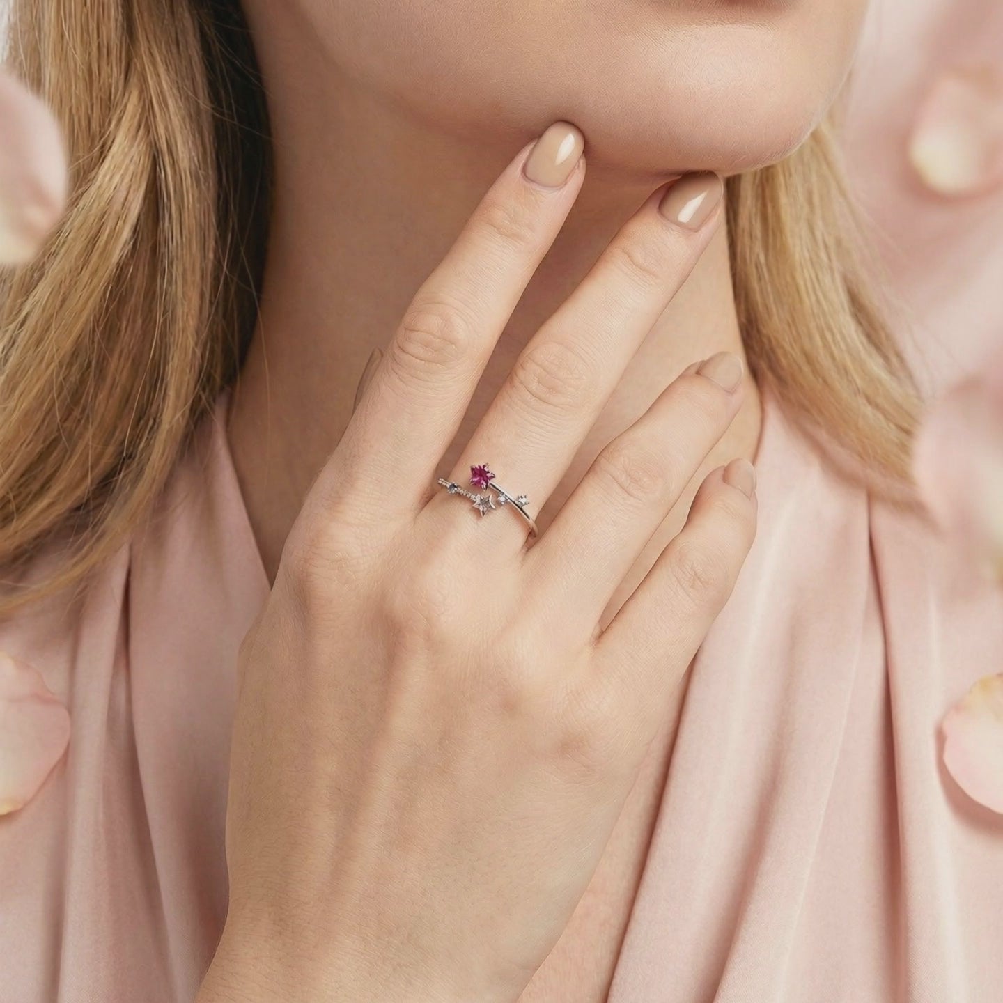 Stellaris bypass ring with simulated pink tourmaline in solid gold.