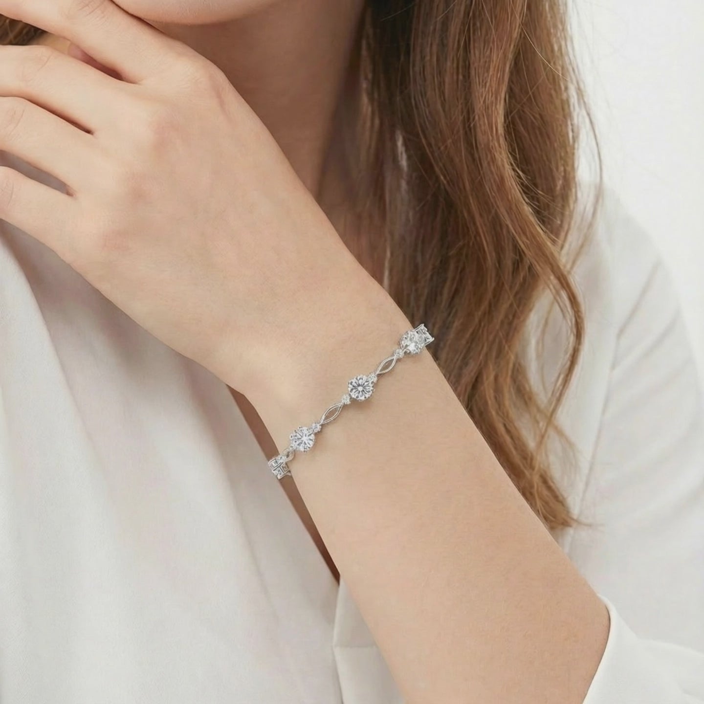 A solid gold bracelet with simulated diamonds.