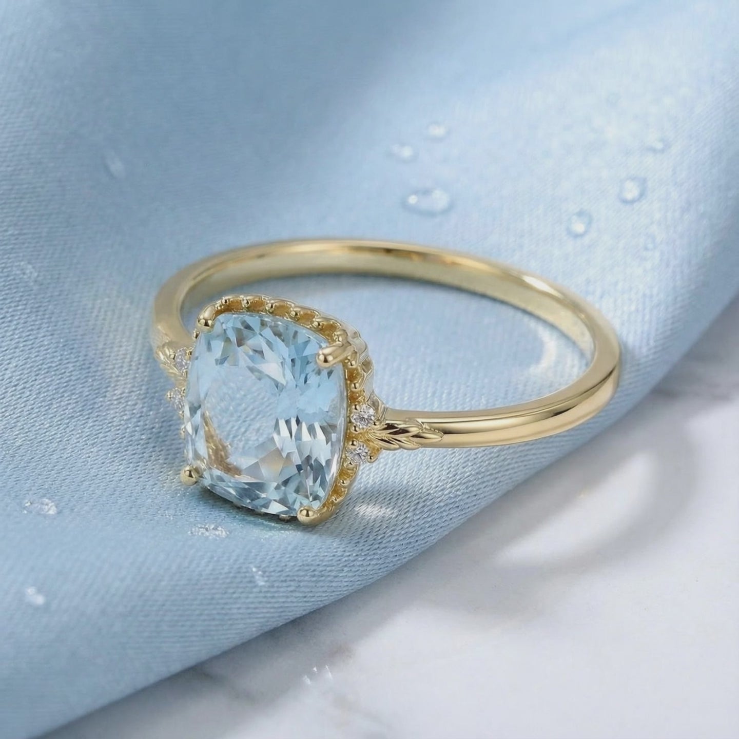 Solid gold ring with simulated aquamarine stone.