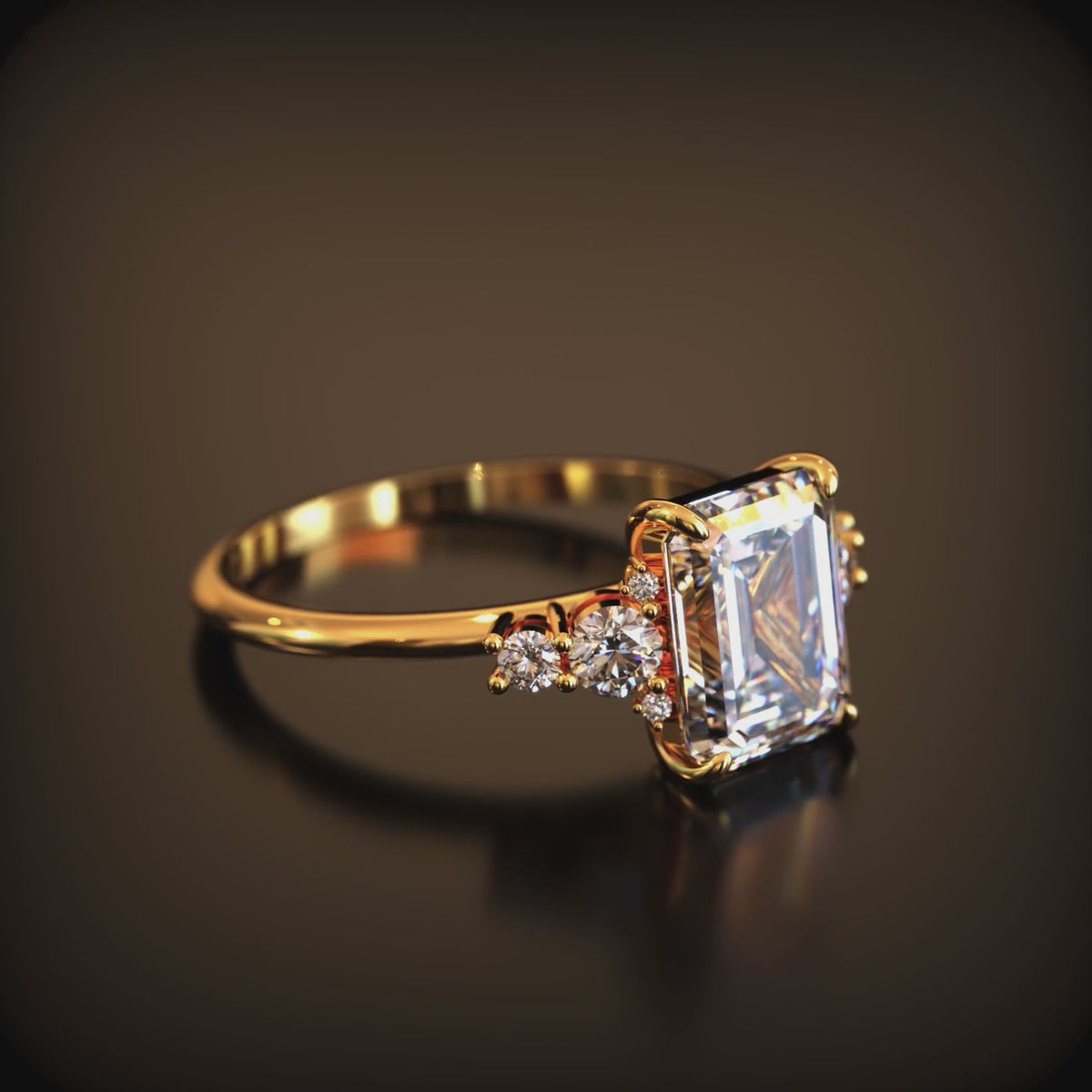 A ring with a 3 carat emerald-cut moissanite in solid gold.