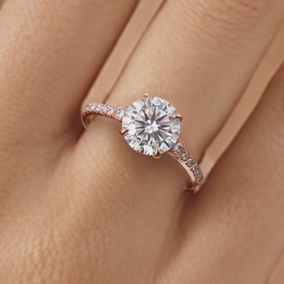 The Luna 2-carat round moissanite ring in solid gold with a pavé band