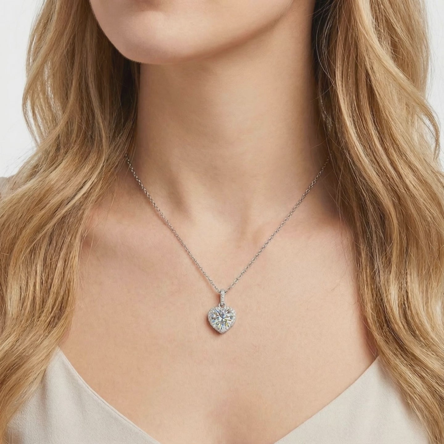 Heart simulated diamond necklace in solid gold.