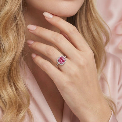 Simulated Pink Tourmaline halo ring in solid gold.