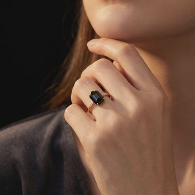 The Noctura solid gold ring featuring an irregular-cut natural black onyx.