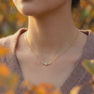 The Callisto Column Opal Necklace in solid gold.