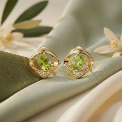 Peridot Oval Stud Earrings in solid gold.
