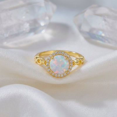Video of a solid gold natural opal ring.