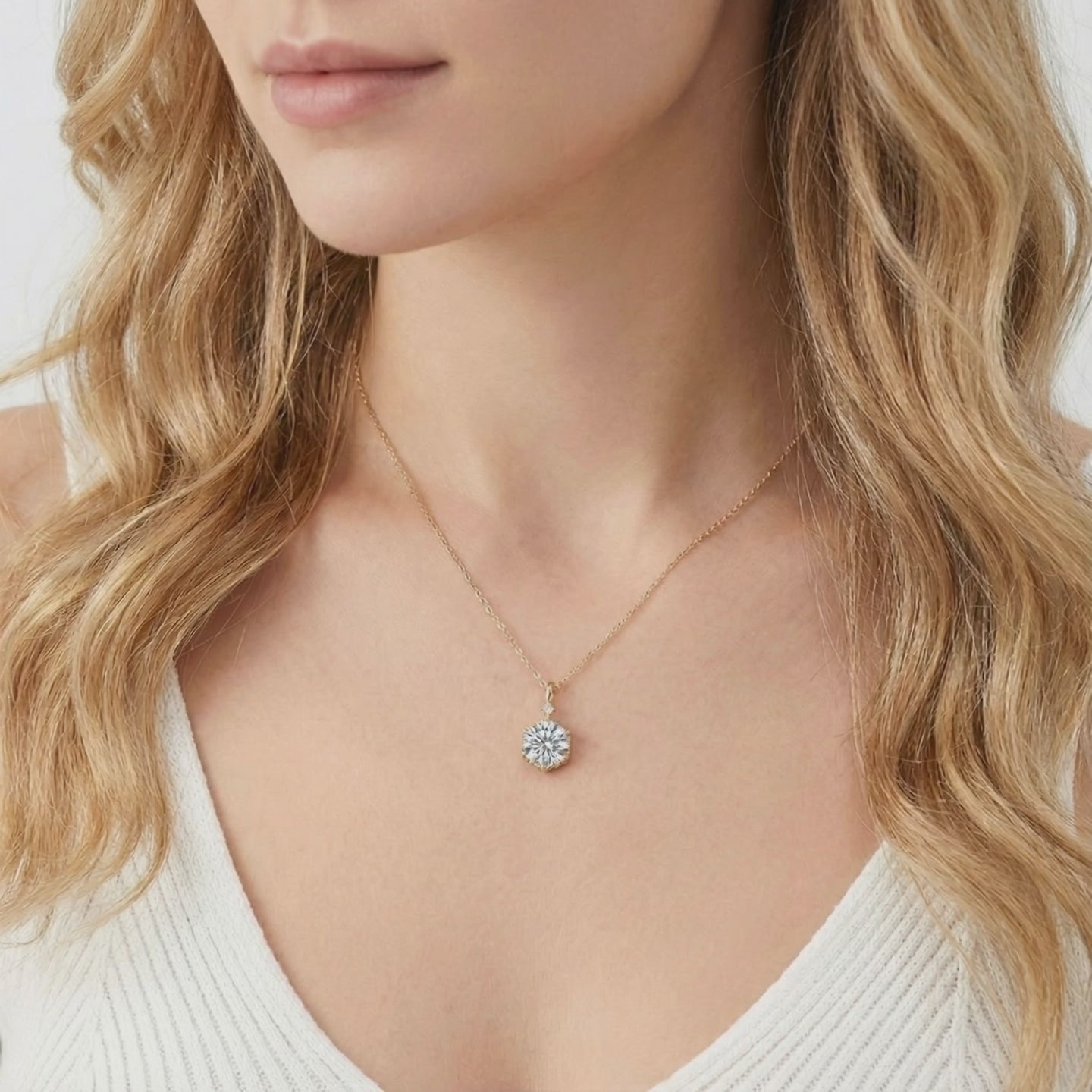 The Hexa Radiant solid gold necklace with a simulated diamond pendant.