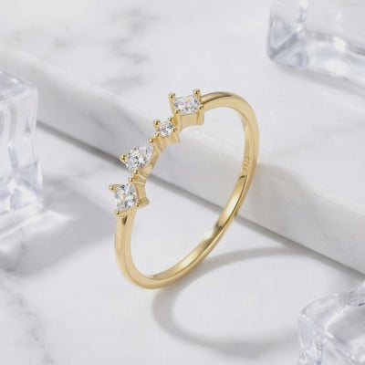 Solid gold ring with VVS Moissanite stones.