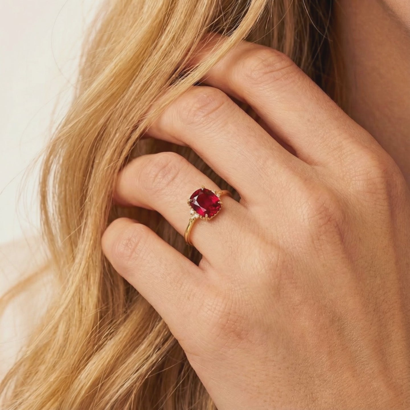 Simulated ruby cushion-cut ring crafted in solid gold.