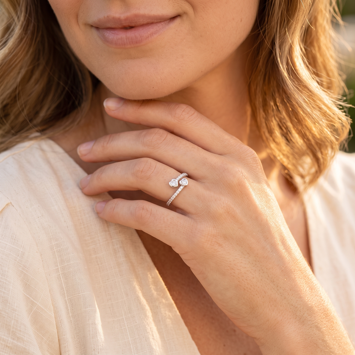 Silver sister ring worn on hand