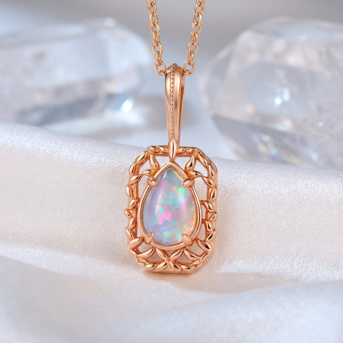 The Avelina Pear Opal Necklace in solid gold.