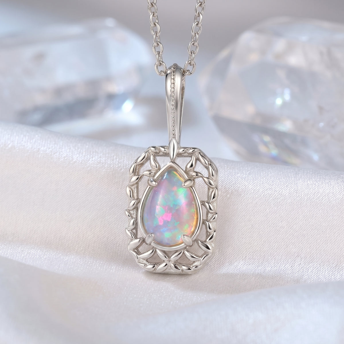 The Avelina Pear Opal Necklace in solid gold.