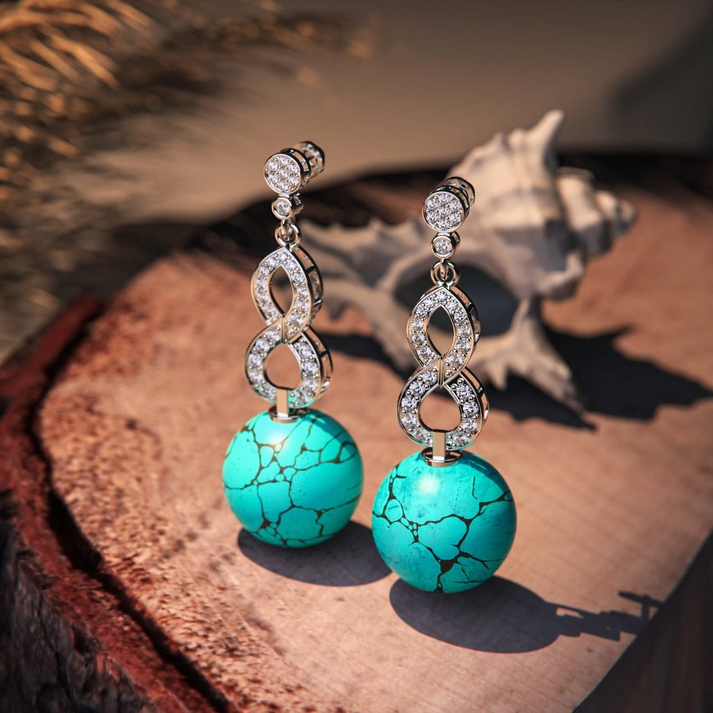 Azure Oceanic Earrings featuring turquoise stones in a sterling silver setting