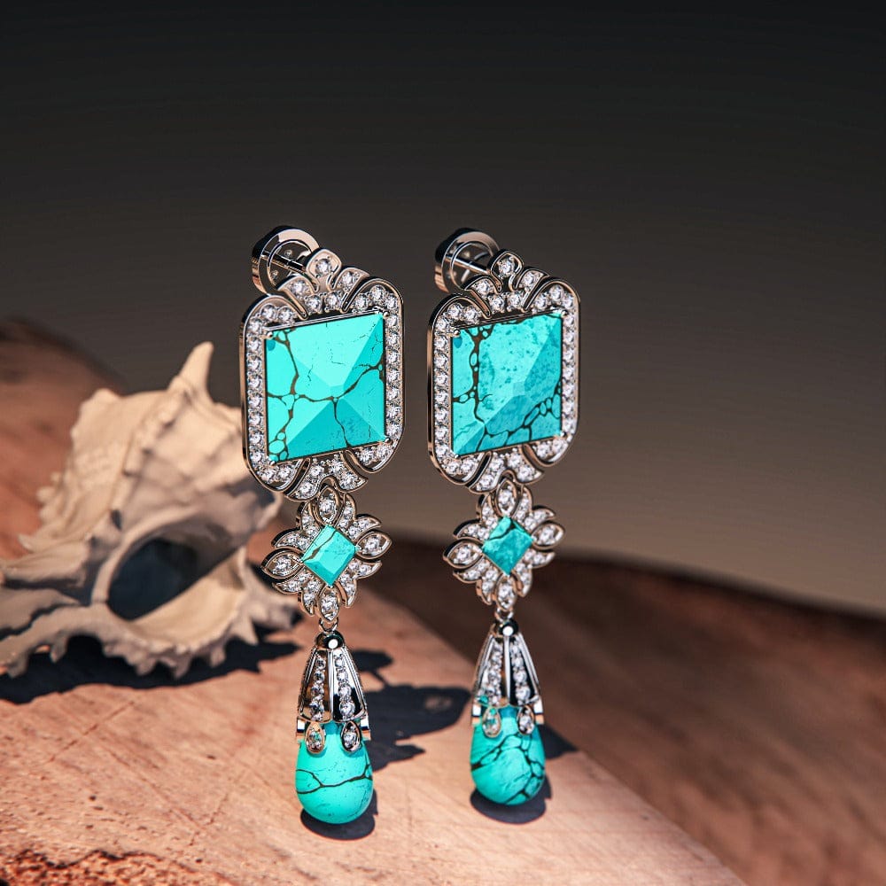 Turquoise Seabed Earrings featuring turquoise stones in a sterling silver setting side view