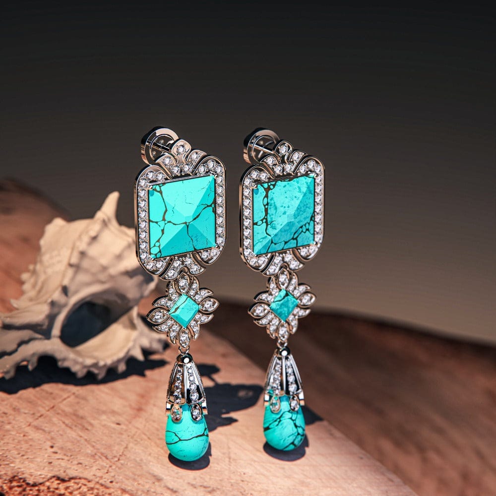 Turquoise Seabed Earrings featuring turquoise stones in a sterling silver setting side view