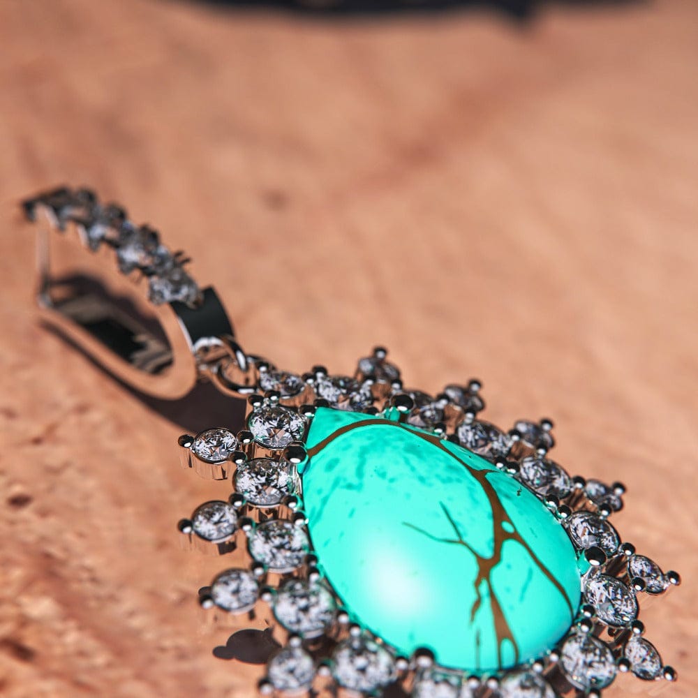 Blue Lagoon Turquoise Earrings featuring turquoise stones set in S925 sterling silver zoomed in view of a single earring
